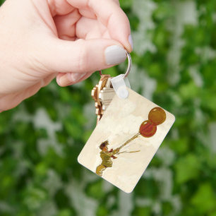 Llavero Niño antiguo con globos rojos en una fiesta de cum