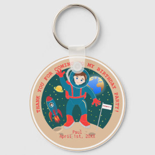 Llavero Niño astronauta en la fiesta de cumpleaños de la l