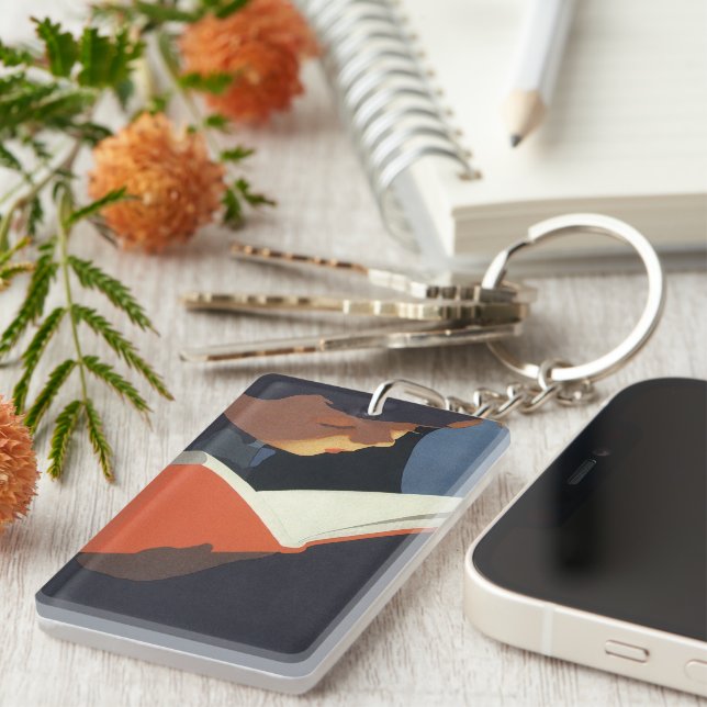 Llavero Niño de la época leyendo un libro de la biblioteca