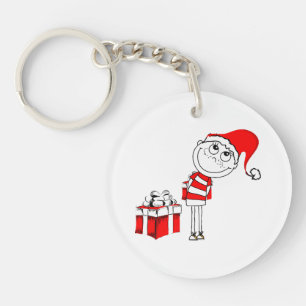 Llavero Niño de sombrero de Santa escondiendo regalo de Na