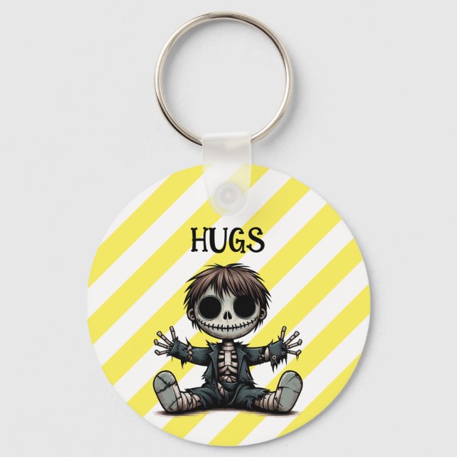 Llavero niño esqueleto incrédulo dando abrazos a arte de g (Anverso)