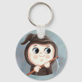 Llavero Niño lindo con un traje de Halloween de muerte