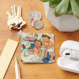 Llavero Niños antiguos jugando con burbujas en una bañera 