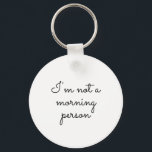 Llavero No soy una persona matutina, diciendo<br><div class="desc">"No soy una persona matutina". Tipografía divertida y de voz en la cadena de claves. Es texto totalmente personalizable y puede cambiarlo según su elección</div>