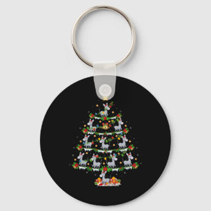 Llavero Nochebuena de Navidad iluminando el árbol de navid