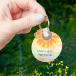 Llavero Nombre personalizado Instructor de yoga girasol<br><div class="desc">Esta moderna cadena botánica de instructores de yoga está decorada con un girasol amarillo sobre un fondo acuático. Personalizable fácil. Utilice la Herramienta de diseño para cambiar el tamaño, estilo o color del texto. A medida que creamos nuestra obra de arte no encontrarás esta imagen exacta de otros diseñadores. Acuarela...</div>