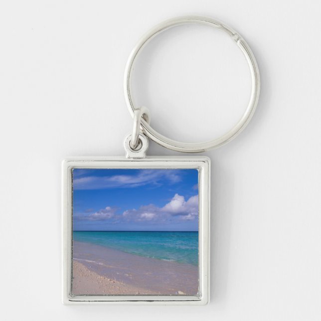 Llavero Nube en cielo azul sobre la playa arenosa (Frente)