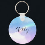 Llavero Nubes mágicas pasteles y arcoiris<br><div class="desc">Una cadena de claves con una imagen de fondo suave y agradable. Tonos azules y nubes rosas con un arcoiris mágico.</div>