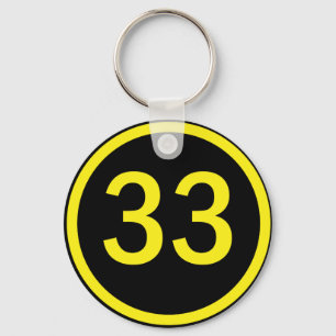Llavero número 33 en círculo