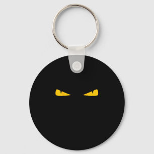 Llavero ojos amarillos de gato asustado