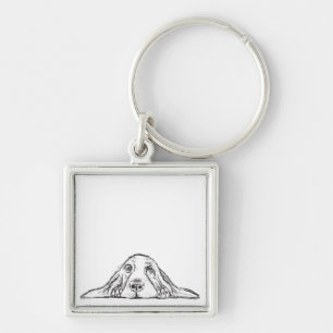 Llavero ojos de perrito simple blanco negro