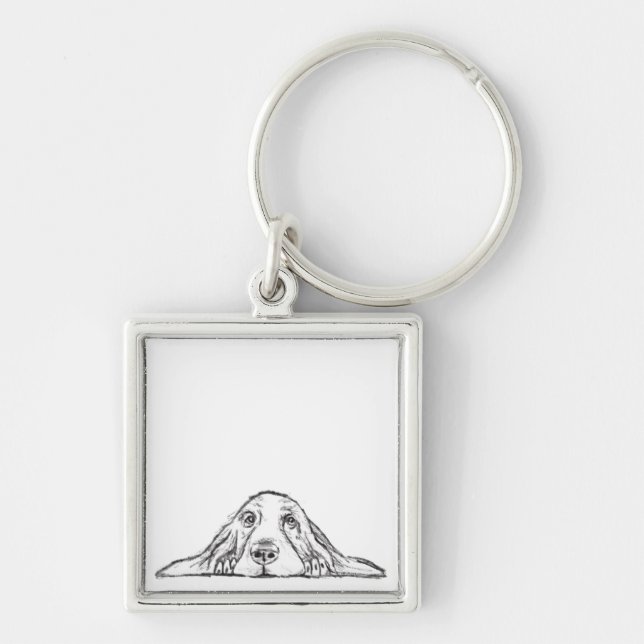 Llavero ojos de perrito simple blanco negro (Frente)