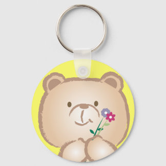 Llavero oso femenino trae flores