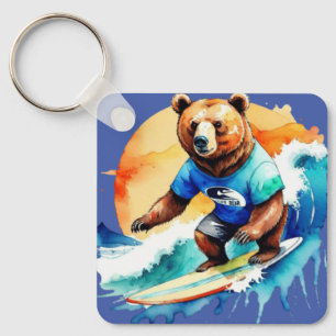 Llavero Oso gracioso surfeando en camiseta