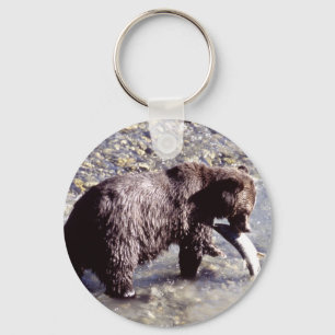 Llavero Oso grizzly que come un salmón