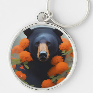Llavero Oso negro en flores Naranjas