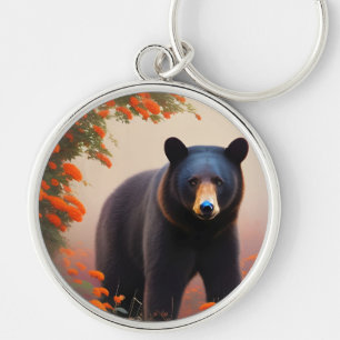 Llavero Oso negro en flores Naranjas
