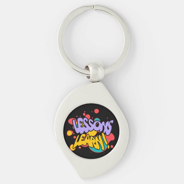 LLAVERO  PAINT SPLASH LESSONS LEARN METAL KEYCHAIN  (Anverso)