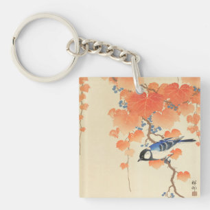 Llavero Pájaro azul en un árbol de Paulownia