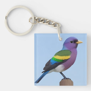 Llavero Pájaro de colores posado en un poste de madera