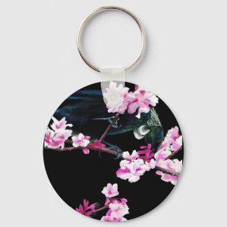 Llavero Pájaro tui en flores de cerezo