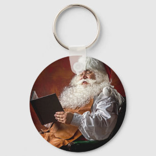Llavero Papá Noel lee el libro