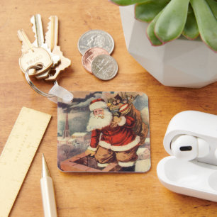 Llavero Papá Noel Victoriano de Navidad antiguo en chimene