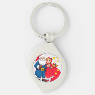 Llavero Papá Noel y niña con una bolsa de regalos