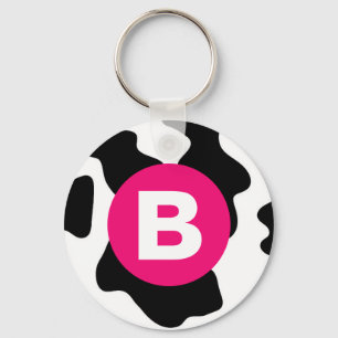 Llavero Parche de vaca extravagante patrón monograma rosa