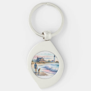 Llavero Paseo costero hacia el faro al atardecer