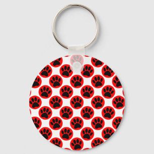 Llavero Patas de perro negras con puntos rojos de polka