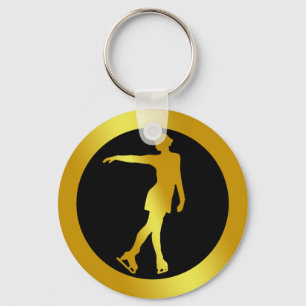 LLAVERO PATINADOR DE FIGURA ORO