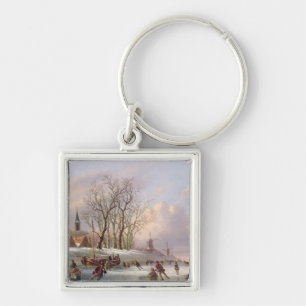 Llavero Patinadores en un río congelado antes de los