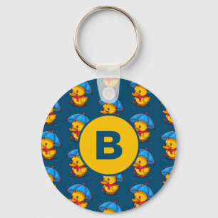 Llavero Patitos de dibujos animados bajo paraguas Monogram