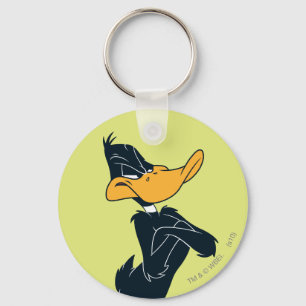 Llavero Pato DAFFY™ con los brazos cruzados