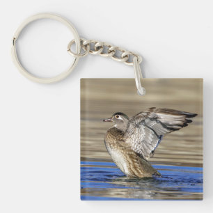 Llavero Pato de madera aleteando sus alas