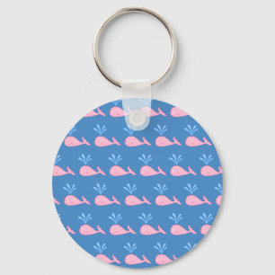 Llavero Patrón de ballena rosada en azul.
