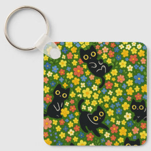 Llavero Patrón de prado floral con gatos negros lindos