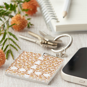 Llavero Patrón floral simétrico con motivos naranjas
