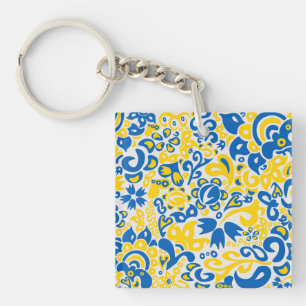 Llavero Patrón folclórico con los colores de la bandera uc