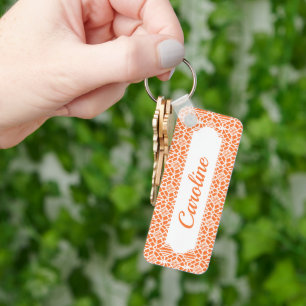 Llavero Pelo naranja Con Patrón De Lazo De Crochet Blanco