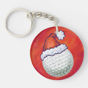 Llavero Pelota de golf en Santa Hat en Red