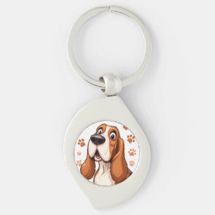 Llavero Perro Basset Alegre con Huellas de Pata Naranjas