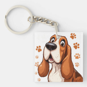 Llavero Perro Basset Alegre con Huellas de Pata Naranjas