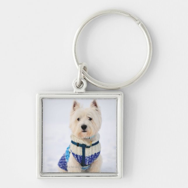 Llavero Perro blanco en ropa en la nieve (Frente)