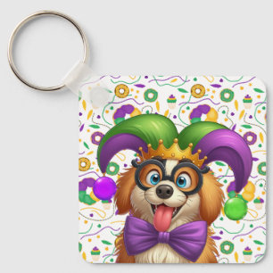Llavero Perro cachorro lindo Mardi Gras en gorra de bufón