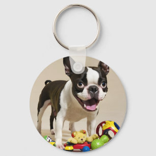 Llavero Perro de Boston Terrier jugando con juguetes