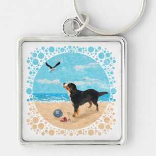 Llavero Perro de montaña bernés en la playa