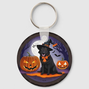 Llavero Perro negro con disfraz de bruja y calabazas