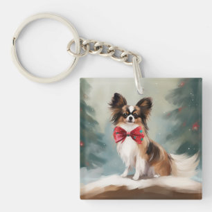 Llavero Perro Papillon en Navidad en la Nieve